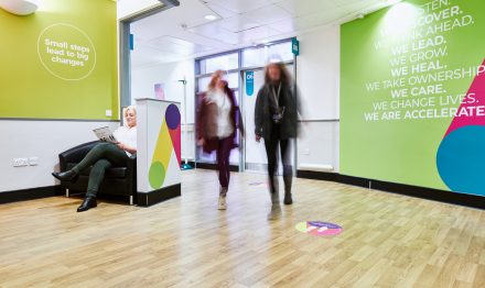 People walking in Accelerate corridor